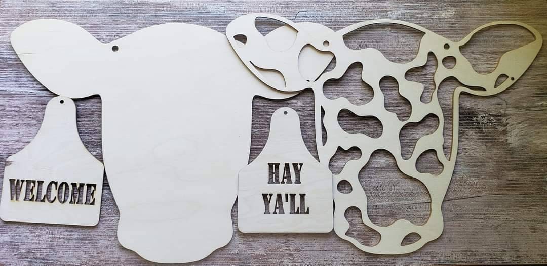 Cow head door sign. Ear tag changes. Welcome and Hay Ya'll