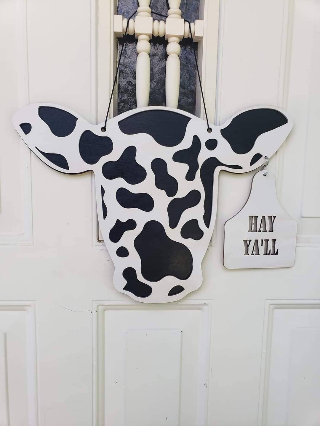 Cow head door sign. Ear tag changes. Welcome and Hay Ya'll